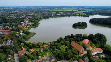 Aerial view of the old town of the city and monastery Bordesholm  in Germany on an overcast day in...
