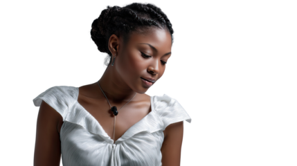 Elegant contemplation: A graceful woman looks downward in a moment of serene reflection, embodying a blend of natural beauty and quiet introspection. 