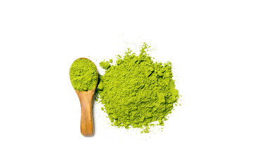 Top view green matcha tea powder isolated on white background