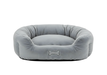 Plush grey oval dog bed with bone detail isolated on transparent background