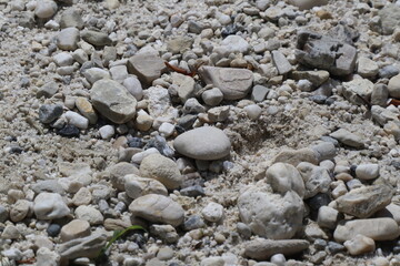 rock and sand from river