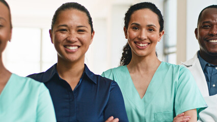 Diverse Medical Team Members Smiling Together in a Bright Healthcare Setting