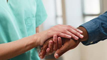 Friendly Interaction Between a Nurse and Patient Emphasizing Compassion and Understanding in...