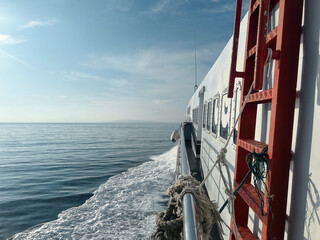 Side View of a Fast Ferry Cruising on the Open Sea