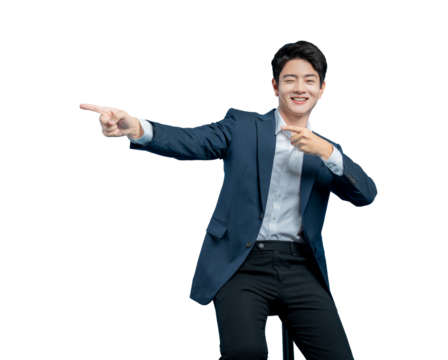 young Asian professional in a suit points to the side with both index fingers, drawing attention to copy space for an advertisement. - Powered by Adobe