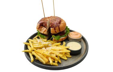 hamburger, potato chips and sauces in a black plate