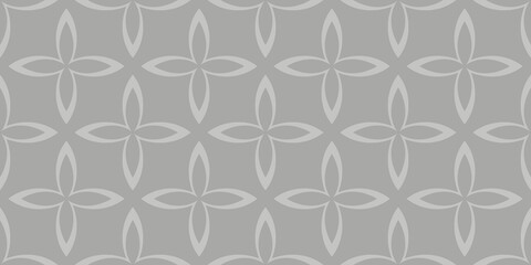 A repeating geometric pattern features interlocking petal shapes in shades of gray, creating a symmetrical, floral motif. Its simplicity and uniformity give a modern and elegant feel.