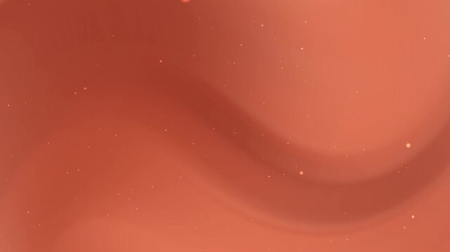 Animated abstract orange smooth background with subtle light specks, ideal for vibrant and energetic designs.