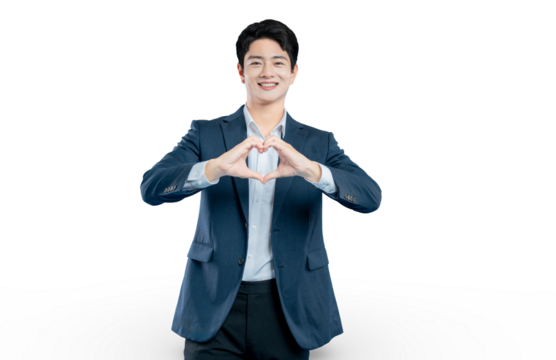 professional in a suit makes a heart gesture with his hands, perfect for concepts of charity, health, and customer care.
