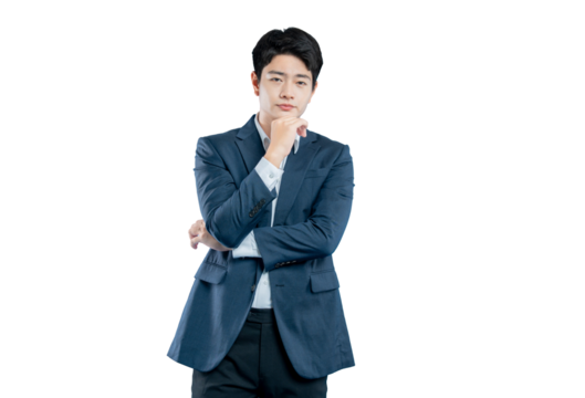 A thoughtful young businessman with his hand on his chin contemplates a decision with a serious expression. Isolated on PNG.