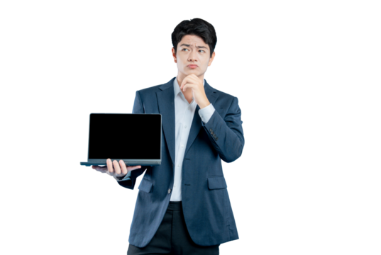 A pensive young professional holds a laptop and looks thoughtful, contemplating a problem or technical issue.
