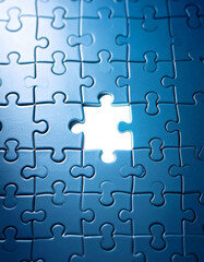 A jigsaw puzzle with a key missing piece, prominently displayed, drawing attention to a crucial unanswered element.