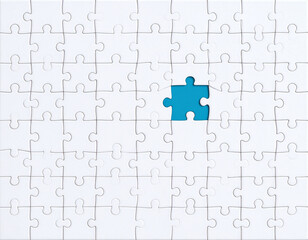 A jigsaw puzzle with a key missing piece, prominently displayed, drawing attention to a crucial unanswered element.