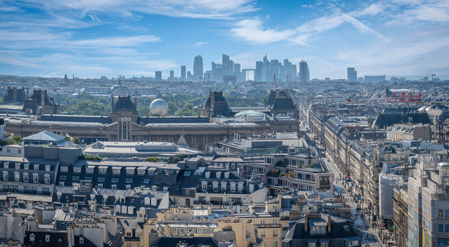 Paris, France - 06 28 2025: View Grand Palais, Arc de Triomphe, Ferris wheel, Olympic Basin ball, Le Louvre, Les Tuilleries Gardens, Rivoli , district La D&eacute;fense from rooftop of Saint-Jacques Tower