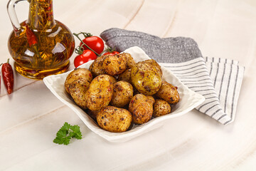 Baked mini potato with herbs