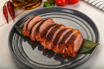 Sliced duck breast baked with cherry