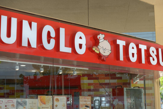 close-up storefront sign of Uncle Tetsu's Japanese Cheesecake, located at Atrium on Bay, 595 Bay St, Toronto