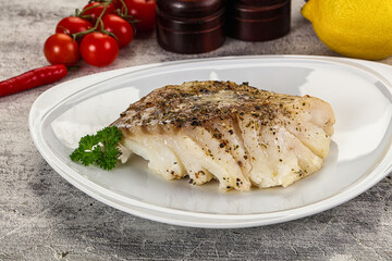 Baked cod fish fillet with spices