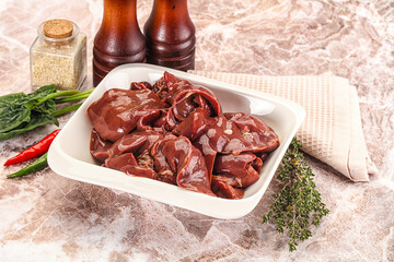Raw uncokked chicken liver in the bowl