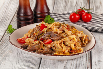 Asian udon noodles with beef