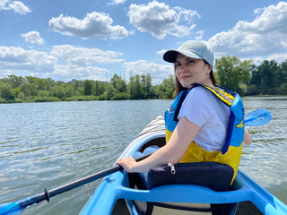Kayaking Through Peaceful River in European Wilderness. Place for Text