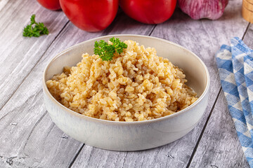 Vegan cuisine - boiled bulgur garnish