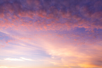 Obraz premium Colorful clouds and sky in the morning,Awesome sunset and soft pink clouds of pastel tones. Image template of textured sky. Gorgeous photo wallpaper. Bright epic sky. Dramatic evening light and fiery 