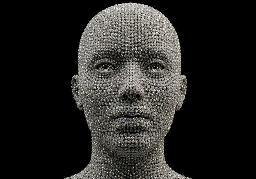 Silver bead and crystal sculpture dazzles with intricate design and shine.