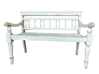 A vintage wooden bench painted in distressed white with turned spindles on the backrest and...