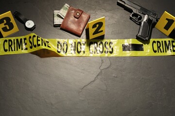 Forensic expertise. Crime scene with evidence, markers and police tape on grey background, flat...