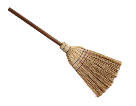 Classic broomstick side view with straw bristles, isolated on white.