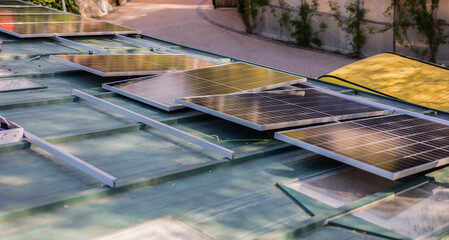 Solar panels generating renewable energy on a green roof