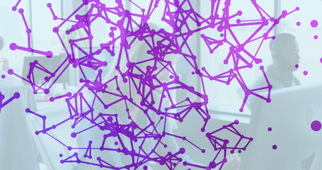 Purple network connections image over people working in modern office