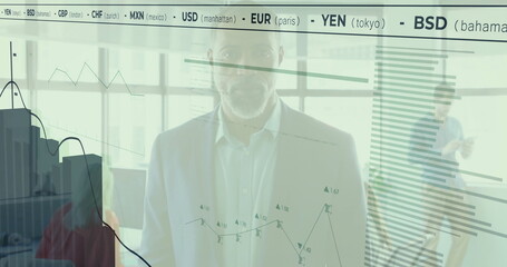 Standing African American man analyzing digital charts on office glass wall showing currency ticker