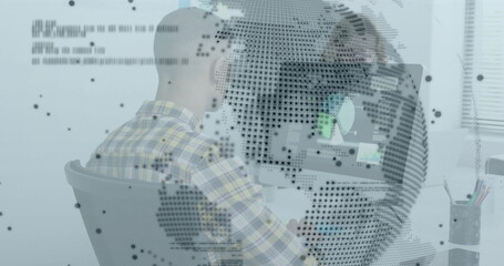 Man working at computer with digital globe and code overlay image