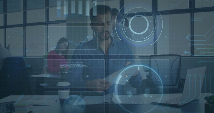 In office, business professionals processing digital data with image overlay