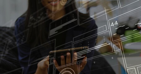 Tapping woman in navy blazer interacting with touchscreen tablet at office lounge, digital overlays