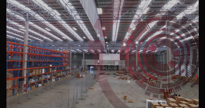 Showing warehouse interior featuring steel-truss roof under fluorescent lights, with pallet racks - Powered by Adobe