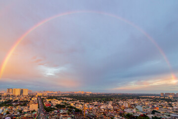 Saigon, Vietnam - 29 April, 2025 - A stunning panoramic view of an urban skyline under a vivid...