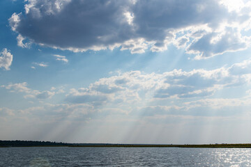 cloudscape on the calm lake in Chobe National Park