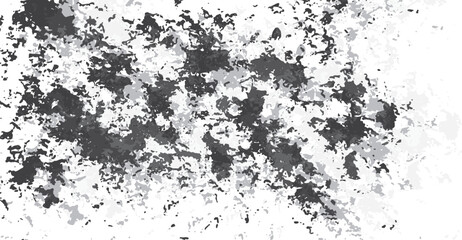 Obraz premium Abstract mottled background with textures of gray and dark shapes splattered against a white backdrop, creating a visually stimulating and unique pattern that evokes a sense of artistic dynamism