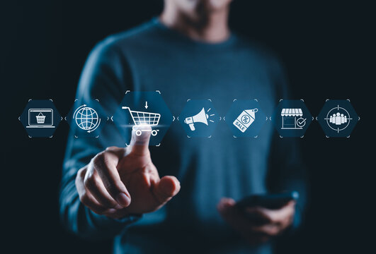 Online Shopping and E-commerce Technology Concept. Man interacts with icons representing online shopping, marketing, discount, ecommerce, retail industry, business strategy, modern consumer engagement