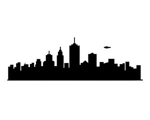 Obraz premium Silhouette of a City Skyline with a UFO in the Background