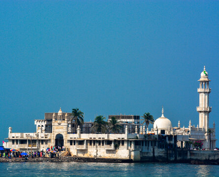 Closeup picture showing the famous Sufi Shrine 'Haji Ali Dargah' in Mumbai, Maharashtra, India. Completed in 1431 it is a very famous tourist spot and holy place of worship in Sufism in Mumbai city