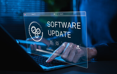 Software Update and System Upgrade Concept. Person holding phone while using laptop with software update progress interface and security, technology maintenance, application upgrades, system security.