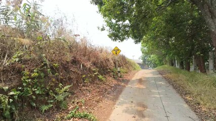 Yellow Road Sign: Directional Arrow on Secondary Road
