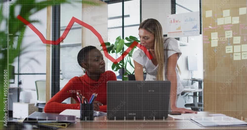 Poster Colleagues analyzing data at desk showing red chart overlay pointing laptop, nodding, writing notes