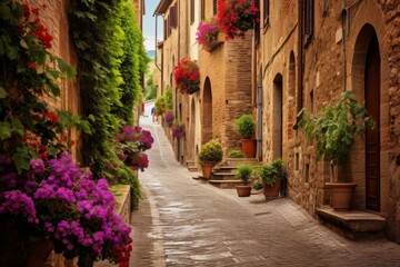 Fototapeta premium Charming uphill street in italy, with vibrant flowers decorating the old stone buildings
