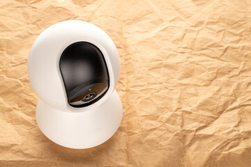 One home camera on kraft paper, close-up.