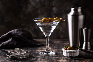Traditional martini cocktail with olives and